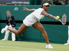 Venus Williams of the US in action during the match against Japan's Kimiko Date-Krumm at the All England Lawn Tennis Championships at Wimbledon, Wednesday, June 22, 2011. (AP Photo/Kirsty Wigglesworth)