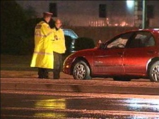 Peel Regional Police officers at the scene of a collision involving a vehicle and pedestrian on Rutherford Road in Brampton on Wednesday, June 22, 2011.