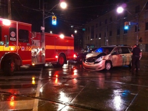 A van sustained a crumpled front end in a crash with an ambulance at Dundas Street East and Parliament Street early Thursday, June 23, 2011. A paramedic suffered minor injuries, police said. (CP24/Tom Stefanac)