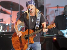 Bret Michaels performs during Muhammad Ali Celebrity Fight Night XVII on Saturday March. 19, 2011, in Phoenix. A federal judge in Los Angeles has moved Michaels' lawsuit over an injury at the 2009 Tony Awards to a New York federal court. (AP Photo/Darryl Webb)