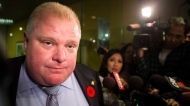 Toronto Mayor Rob Ford makes a statement to the media outside his office at Toronto's city hall after the release of a video on Thursday November 7, 2013. (Chris Young/The Canadian Press)