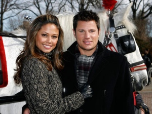 In this Feb. 9, 2010 photo, Vanessa Minnillo and Nick Lachey pose together with a carriage horse in New York's Central Park . After dating for more than five years, Nick Lachey and Vanessa Minnillo are married, Friday, July 15, 2011. (AP Photo/Jason DeCrow)