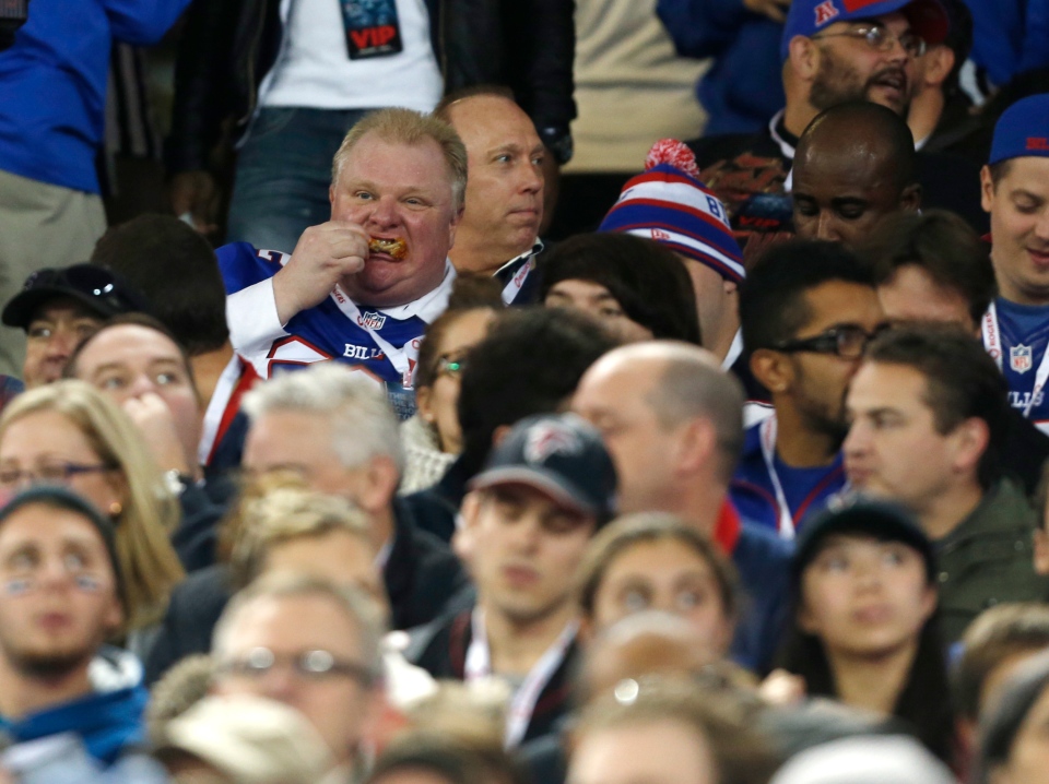 Rob Ford eats chicken wings, steals a seat and works up the crowd