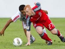 Toronto FC's Richard Eckersley, right, and Real Esteli FC's Manuel Rosas battle for the ball during the first half of a CONCACAF Champions League soccer match in Toronto Wednesday, July 27, 2011. THE CANADIAN PRESS/Darren Calabrese