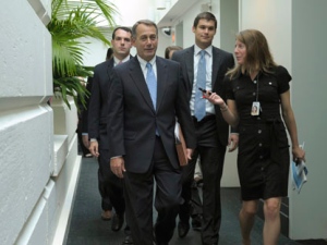 House Speaker John Boehner of Ohio walks out of a meeting on Capitol Hill in Washington, Thursday, July 28, 2011. (AP Photo/Susan Walsh)