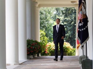 President Barack Obama walks to the Rose Garden of the White House in Washington, Tuesday, Aug. 2, 2011, to make a statement after the Senate passed the debt ceiling legislation. (AP Photo/Carolyn Kaster)