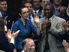 Rep. Gabrielle Giffords, D-Ariz., appears on the floor of the House of Representatives in Washington, Monday, Aug. 1, 2011. 