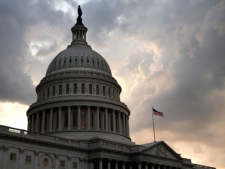 This Monday, Aug. 1, 2011 picture shows the U.S. Capitol just after the House voted to pass debt legislation on Capitol Hill in Washington. Credit rating agency Standard & Poor's says it has downgraded the United States' credit rating for the first time in the history of the ratings. The credit rating agency says that it is cutting the country's top AAA rating by one notch to AA-plus. The credit agency said late Friday, Aug. 5, 2011 that it is making the move because the deficit reduction plan passed by Congress on Tuesday did not go far enough to stabilize the country's debt situation. (AP Photo/Jacquelyn Martin)