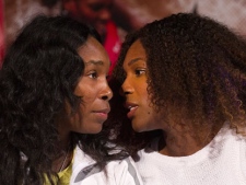 Sisters Serena and Venus Williams take part in the official Rogers Cup draw in Toronto on Friday, August 5, 2011. THE CANADIAN PRESS/Nathan Denette