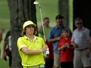 Rickie Fowler hits from the ninth fairway during second round play in the Bridgestone Invitational golf tournament at Firestone Country Club in Akron, Ohio on Friday, Aug. 5, 2011. (AP Photo/Amy Sancetta)