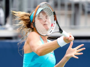 Daniela Hantuchova of Slovakia hits a return during her match against Gisela Dulko of Argentina at the Rogers Cup women's tennis tournament in Toronto Tuesday, August 9, 2011. THE CANADIAN PRESS/Darren Calabrese