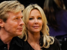 Actress Heather Locklear attends a NBA basketball game between Phoenix Suns and the Los Angeles Lakers, Thursday, Nov. 12, 2009, in Los Angeles. (AP Photo/Gus Ruelas)
