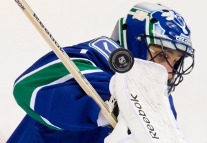 Luongo steps down as Canucks captain