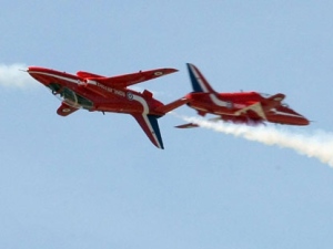 In this Monday, March 22, 2010 file photo of Britain's Red Arrows aerobatics squad as they flies over the Greek Air Force base of Kastelli, on the island of Crete, during a media presentation . A plane belonging to the Red Arrows aerobatics display team crashed Saturday Aug. 20, 2011 while taking part in an air show in Bournemouth southern England, the military and media reports said. (AP Photo/Image Photo Services)