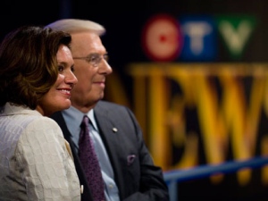 Lisa LaFlamme (left) and Lloyd Robertson (right) address the media as CTV announced that LaFlamme will succeed Robertson as anchor of CTV News, in Toronto on Friday, July 9, 2010. THE CANADIAN PRESS/Adrien Veczan)