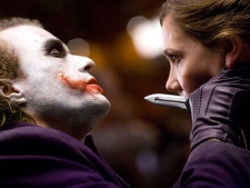 Heath Ledger as the Joker and Maggie Gyllenhaal as Rachel Dawes in Warner Bros. Pictures' 'The Dark Knight.'