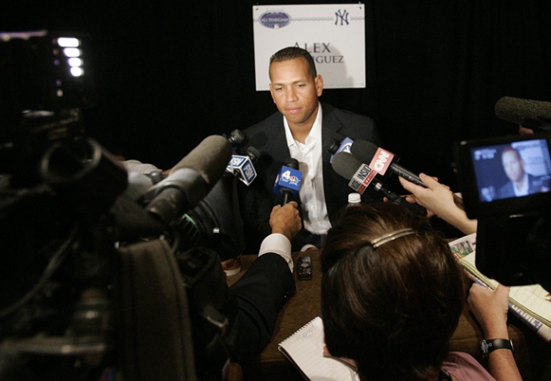 Alex Rodriguez is surrounded by reporters during the Major League Baseball All Star Player media availability in New York on Monday, July 14, 2008. (AP / Mary Altaffer)