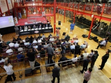 Global Boxing Gym in North Bergen, N.J., is seen filled with media during a press conference held by private investigators researching the alleged suicide of boxing champion Arturo Gatti, Wednesday, Sept. 7, 2011. The private investigators believe Gatti did not commit suicide in 2009. Gatti was found dead at an apartment his family had rented in the Brazilian seaside resort of Porto de Galihnas. His widow, initially a suspect in his death, and the Gatti family are involved in a dispute over the boxer's fortune. (AP Photo/Julio Cortez)