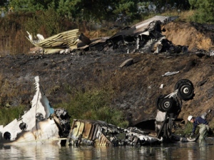 Wreckage of a Russian Yak-42 jet, carrying the Lokomotiv KHL team, is seen near the city of Yaroslavl on the Volga River about 150 miles (240 kilometres) northeast of Moscow, Russia on Wednesday, Sept. 7, 2011. (AP Photo/Misha Japaridze)