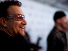Bono (left) and The Edge (right) arrive at the gala for the U2 documentary film "From the Sky Down" which opens the 2011 Toronto International Film Festival on Thursday September 8, 2011. THE CANADIAN PRESS/Chris Young