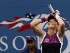 Samantha Stosur of Australia reacts after winning the women's championship match against Serena Williams at the U.S. Open tennis tournament in New York, Sunday, Sept. 11, 2011. (AP Photo/Elise Amendola) 