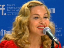 Madonna speaks to reporters at a Toronto International Film Festival press conference on Monday, Sept. 12, 2011.