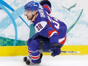 In this Feb. 27, 2010 file photo, Slovakia's Pavol Demitra (38) celebrates after scoring against Finland during the second period of the men's bronze medal ice hockey game at the Vancouver 2010 Olympics in Vancouver, British Columbia. A Russian jet carrying a top ice hockey team crashed just after takeoff Wednesday, Sept. 7, 2011, killing at least 43 people, including Demitra, and leaving two others critically injured. (AP Photo/Gene J. Puskar, File)