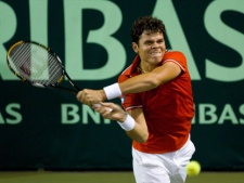 Canada's Milos Raonic returns a shot to Israel's Amir Weintraub during their Davis Cup World Group play-off Tennis match in Canada Stadium in Ramat Hasharon near Tel Aviv, Israel, Friday, Sept. 16, 2011. (AP Photo/Ariel Schalit)