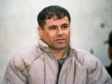 In this June 10, 1993 file photo, Mexican drug lord Joaquin "El Chapo" Guzman, is shown to the press after his arrest at the high security prison of Almoloya de Juarez, on the outskirts of Mexico City. Mexico's most powerful kingpin has won a two-year bloody battle for control of drug routes through the border city of Ciudad Juarez, U.S. intelligence has concluded, the latest indication that Joaquin "El Chapo" Guzman's Sinaloa cartel is coming out on top in the country's drug war. (AP Photo/Damian Dovarganes)