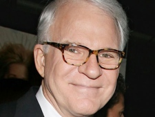 In this Dec. 9, 2009 file photo, Steve Martin poses at the world premiere of his film, "It's Complicated," in New York. Martin is giving some free advice to Eddie Murphy about hosting the Academy Awards. The 66-year-old entertainer posted an "open letter" to Murphy on his website Tuesday, Sept. 20, 2011, filled with tips based on Martin's three Oscar-hosting stints. Eddie Murphy will be hosting the Oscar awards in 2012. (AP Photo/Starpix, Dave Allocca)