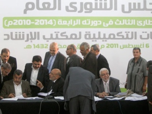 Members of Egypt's Muslim Brotherhood movement hold their first open internal election since the ouster of President Hosni Mubarak, with more than 100 members of the group's policy making body electing three new members, according to Brotherhood spokesman Mahmoud Ghozlan, in Cairo, Egypt Saturday, Aug. 6, 2011. (AP Photo/Ahmed Ali)