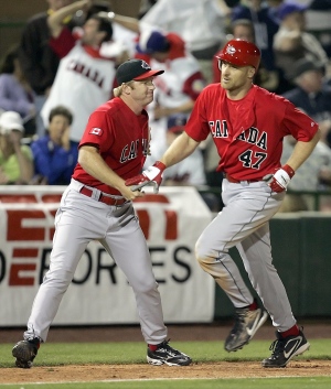 Blue Jays first base coach Tim Leiper wears Maple Leaf proudly