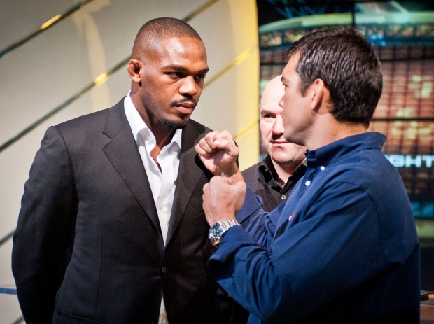 Light-heavyweight champion Jon Jones (left to right), UFC President Dana White, and Lyoto Machida attend a news conference promoting UFC140 in Toronto, Wednesday, Oct.12, 2011. THE CANADIAN PRESS/Ryan Enn Hughes