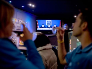 A couple drink whilst they look at Spanish TV at a bar in Pamplona northern Spain, Thursday Oct. 20, 2011 as it displays a video released by the Basque separatist group ETA. The Basque daily Gara says the armed group ETA has issued a statement Thursday Oct. 20, 2011 saying it is ending its armed campaign and calls on Spain and France to open talks. (AP Photo/Alvaro Barrientos)