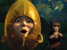 In this image released by Paramount Pictures, from left, Humpty Dumpty, voiced by Zach Galifianakis,and Kitty Softpaws, voiced by Salma Hayek, are shown in a scene from "Puss in Boots." (AP Photo/Paramount Pictures) 