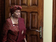 Liberian President Ellen Johnson Sirleaf arrives at a meeting with members of the press, at the Ministry of Foreign Affairs in Monrovia, Liberia Thursday, Nov. 10, 2011. (AP Photo/Rebecca Blackwell)