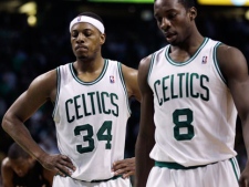 Boston Celtics forward Paul Pierce, left, looks down as he walks up the court with teammate Jeff Green while Boston trailed the Miami Heat during overtime of Game 4 of a second-round NBA playoff basketball series in Boston, Monday, May 9, 2011. The Heat beat the Celtics 98-90, and lead the series 3-1. (AP Photo/Charles Krupa)