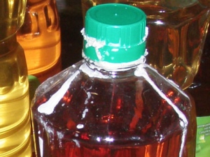 Cocaine marks appear on a sunflower oil bottle  after a massive bust by Canada Border Services Agency at the Port of Montreal. Authorities seized 310 kilograms of cocaine concealed in bottles of sunflower oil. (Photo courtesy of Canada Border Services Agency)