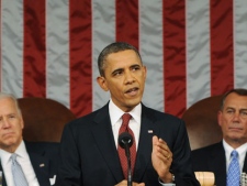 President Barack Obama delivers his State of the Union address on Capitol Hill in Washington, Tuesday, Jan. 24, 2012. Listening in back are Vice President Joe Biden and House Speaker John Boehner, right. (AP Photo/Saul Loeb)