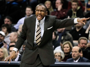 Toronto Raptors coach Dwayne Casey directs his team in the first quarter of an NBA basketball game against the Denver Nuggets on Friday, Jan. 27, 2012, in Denver. (AP Photo/Joe Mahoney)