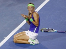 Victoria Azarenka of Belarus celebrates after defeating Maria Sharapova of Russia during the women's singles final at the Australian Open tennis championship, in Melbourne, Australia, Saturday, Jan. 28, 2012. (AP Photo/Aaron Favila)