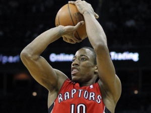 Toronto Raptors' DeMar DeRozan shoots against the New Jersey Nets during the third quarter of an NBA basketball game, Sunday, Jan. 29, 2012, in Newark, N.J. The Raptors won 94-73. (AP Photo/Julio Cortez)