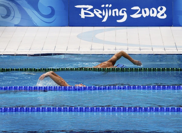 Swimmers practice inside the National Aquatics Center, known as the 'Water Cube' ahead of the Paralympic Games in Beijing Thursday, Sept. 4, 2008. (AP / Andy Wong)