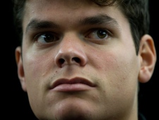 Canadian tennis player Milos Raonic, of Toronto, Ont., looks on during the draw for the Davis Cup in Vancouver, B.C., on Thursday, Feb. 9, 2012. Canada and France are scheduled to play in Davis Cup tennis matches Feb. 10-12 in Vancouver. (THE CANADIAN PRESS/Darryl Dyck)