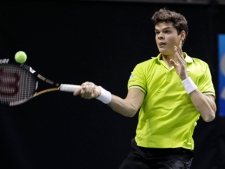 Milos Raonic returns a shot to Tobias Kamke during the SAP Open tennis tournament in San Jose, Calif., on Wednesday, Feb. 15, 2012. (AP Photo/Paul Sakuma)