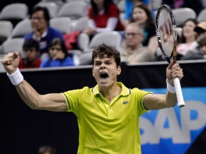 Milos Raonic celebrates his win over Denis Istomin in the championship match of the SAP Open tennis tournament in San Jose, Calif., Sunday, Feb. 19, 2012. Raonic won 7-6 (3), 6-2. (AP Photo/Marcio Jose Sanchez)