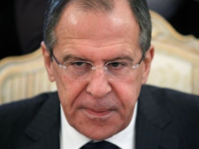 Russian Foreign Minister Sergey Lavrov, listens to his Serbian counterpart Vuk Jeremic, unseen, during their meeting in Moscow, Russia, Friday, March 16, 2012. Lavrov spoke by telephone Thursday with Annan and "expressed his support for the envoy's mission, noting that Russia would provide him with active assistance," the Foreign Ministry said. (AP Photo/Misha Japaridze)