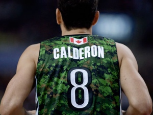 Toronto Raptors' Jose Calderon runs down court wearing a Canadian Forces commemorative jersey during Canadian Forces night at the Air Canada Center during NBA action against the Chicago Bulls in Toronto on Wednesday, March 21, 2012. (THE CANADIAN PRESS/Pawel Dwulit)