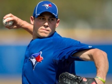 Toronto Blue Jays pitcher Dustin McGowan pitches live batting practice at Jays Spring Training in Dunedin, Fla. on Tuesday, Feb. 28, 2012. (THE CANADIAN PRESS/Frank Gunn)