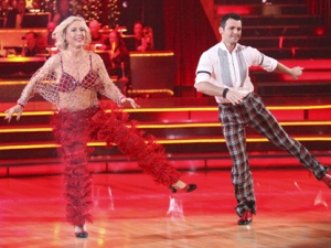 In this photo provided by ABC, tennis champ Martina Navratilova, left, and partner Tony Dovolani perform on "Dancing With the Stars" on Monday, March 26, 2012. (AP Photo/ABC, Adam Taylor) 